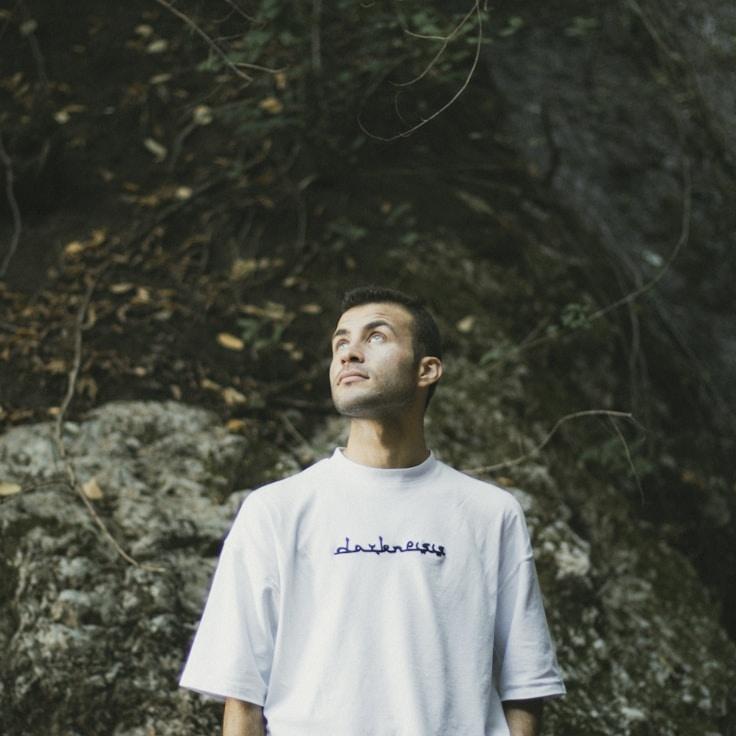 Anya Reed, Lead Design Curator at Everyday Growth System, reviewing corporate floral arrangements